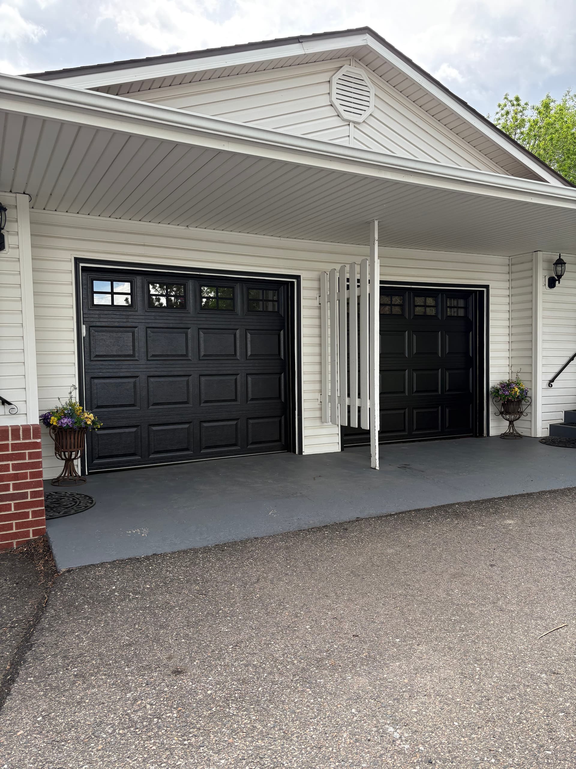 Gallery photos for Old Wooden Garage Doors Replaced With Black Steel Insulated Doors: Image #1