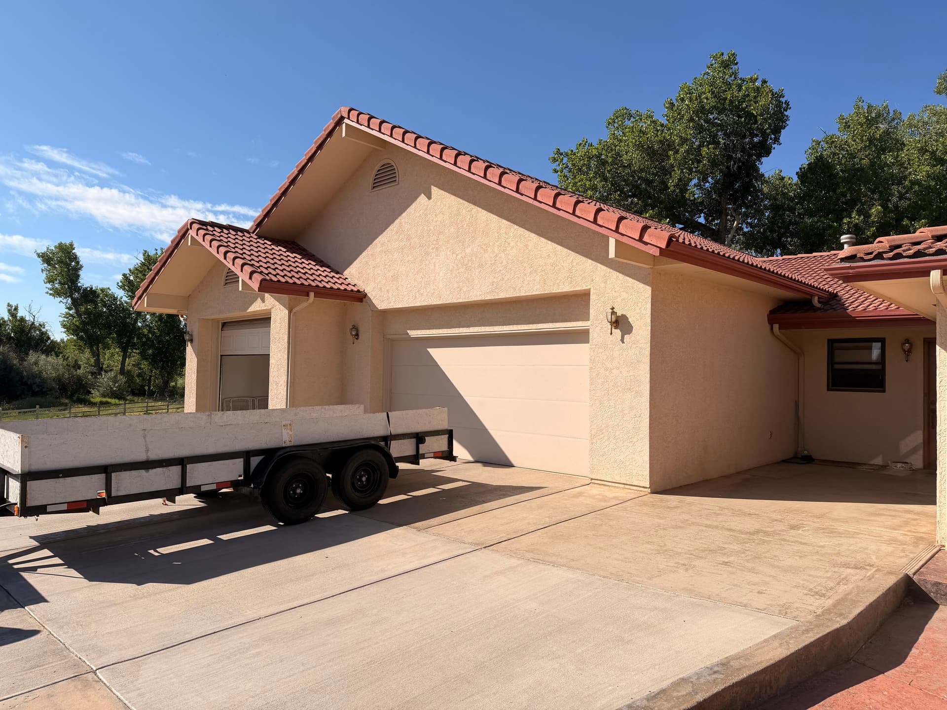 Plain Garage Doors Replaced With Insulated Cathedral Window Doors image
