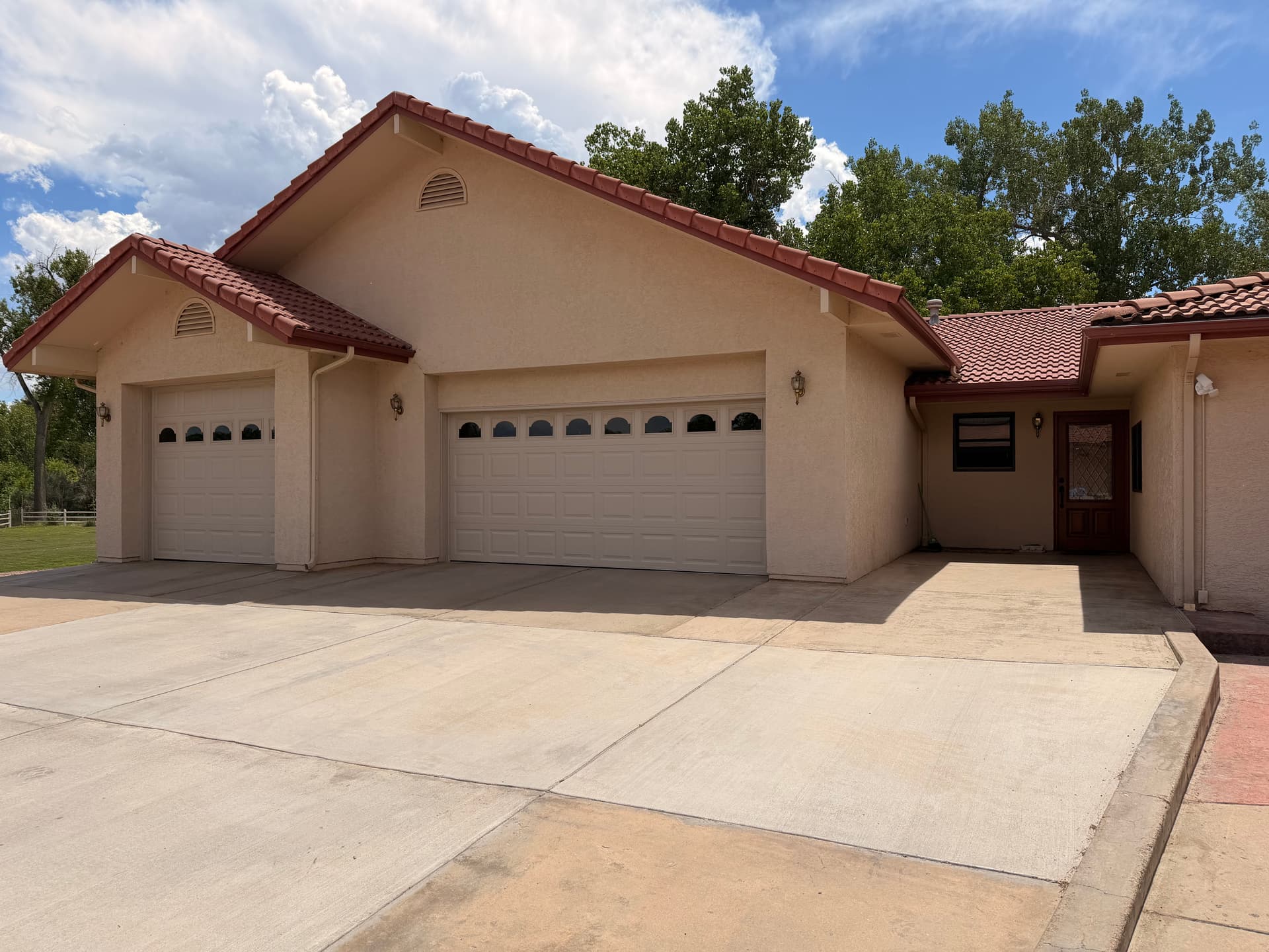 Gallery photos for Plain Garage Doors Replaced With Insulated Cathedral Window Doors: Image #1