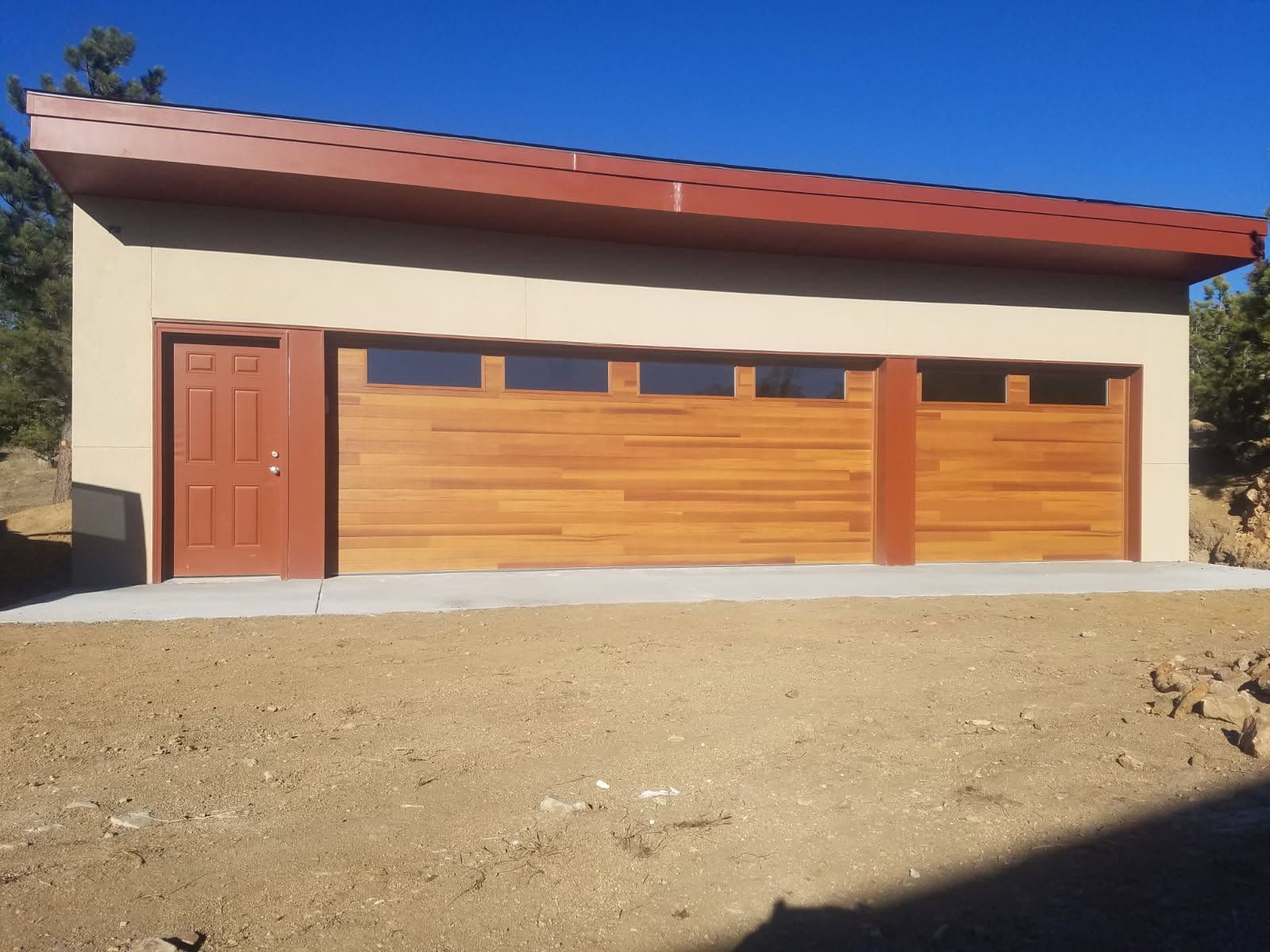 Stylish Plank Style Faux Wood Doors Installed