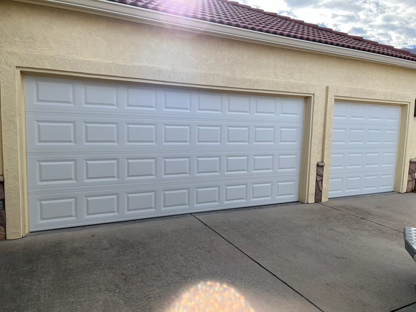 Project Classic White Paneled Garage Doors for a Stunning Home image