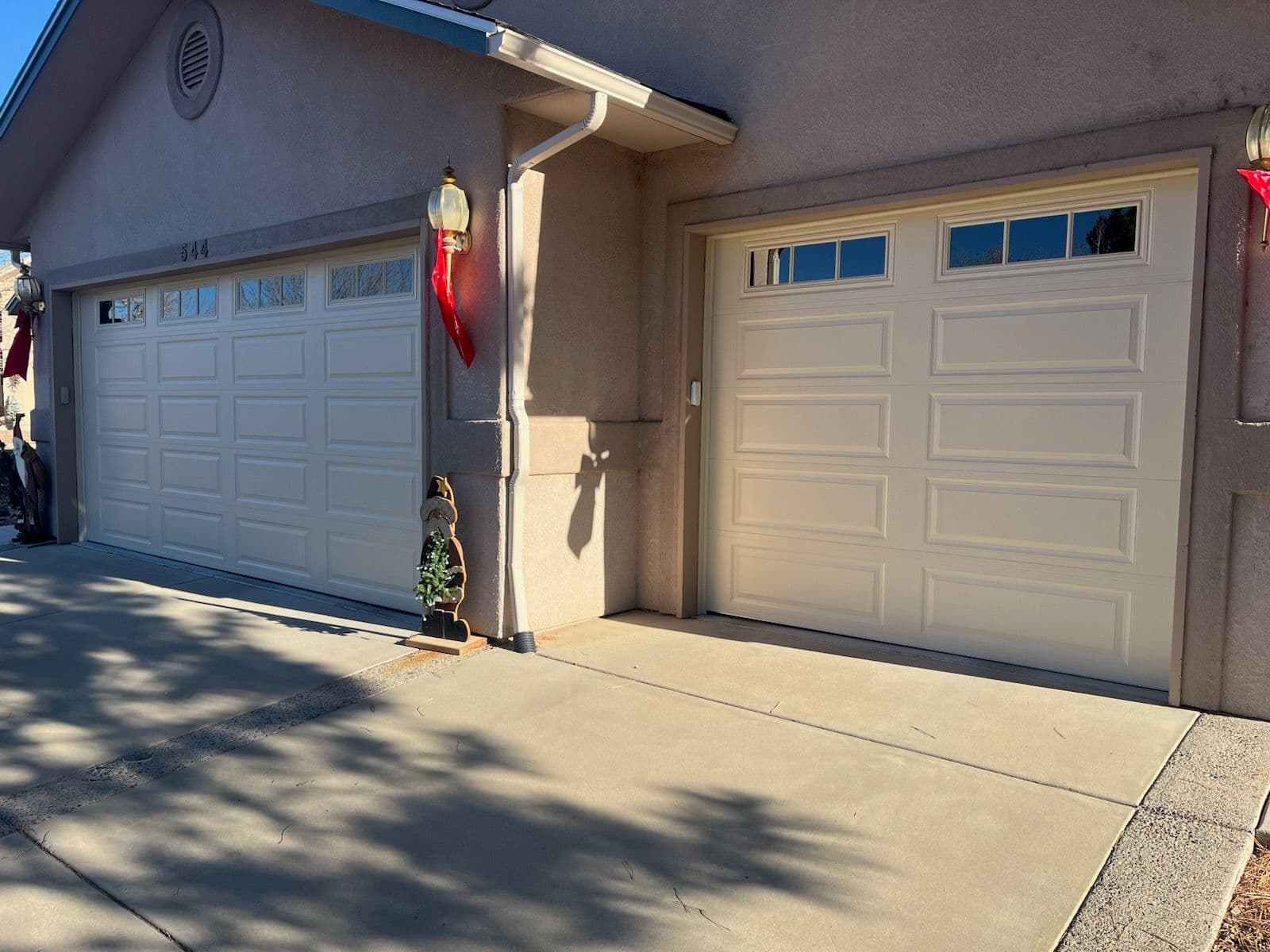 Project Garage Door Upgrade with Almond Long Panels and Stockbridge Windows image
