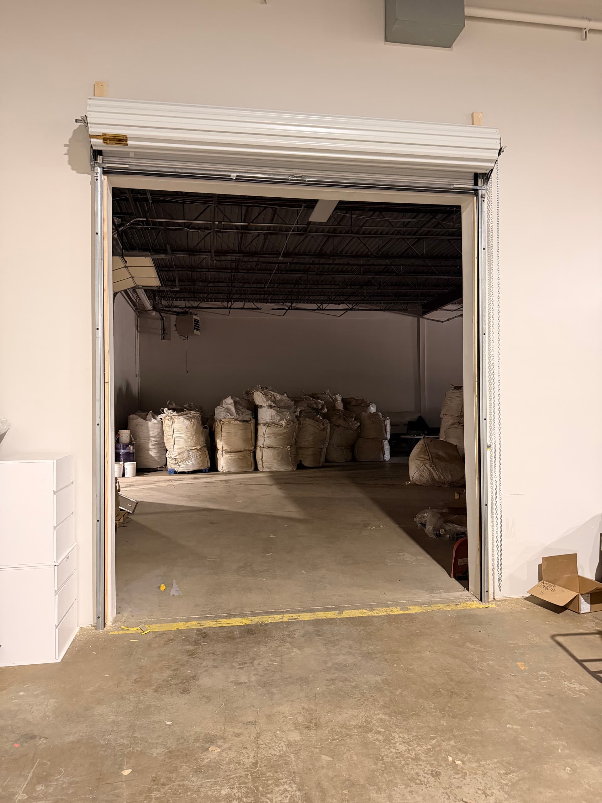 Gallery photos for Rolling Sheet Door with Manual Chain Hoist Saves Serious Space: Image #1