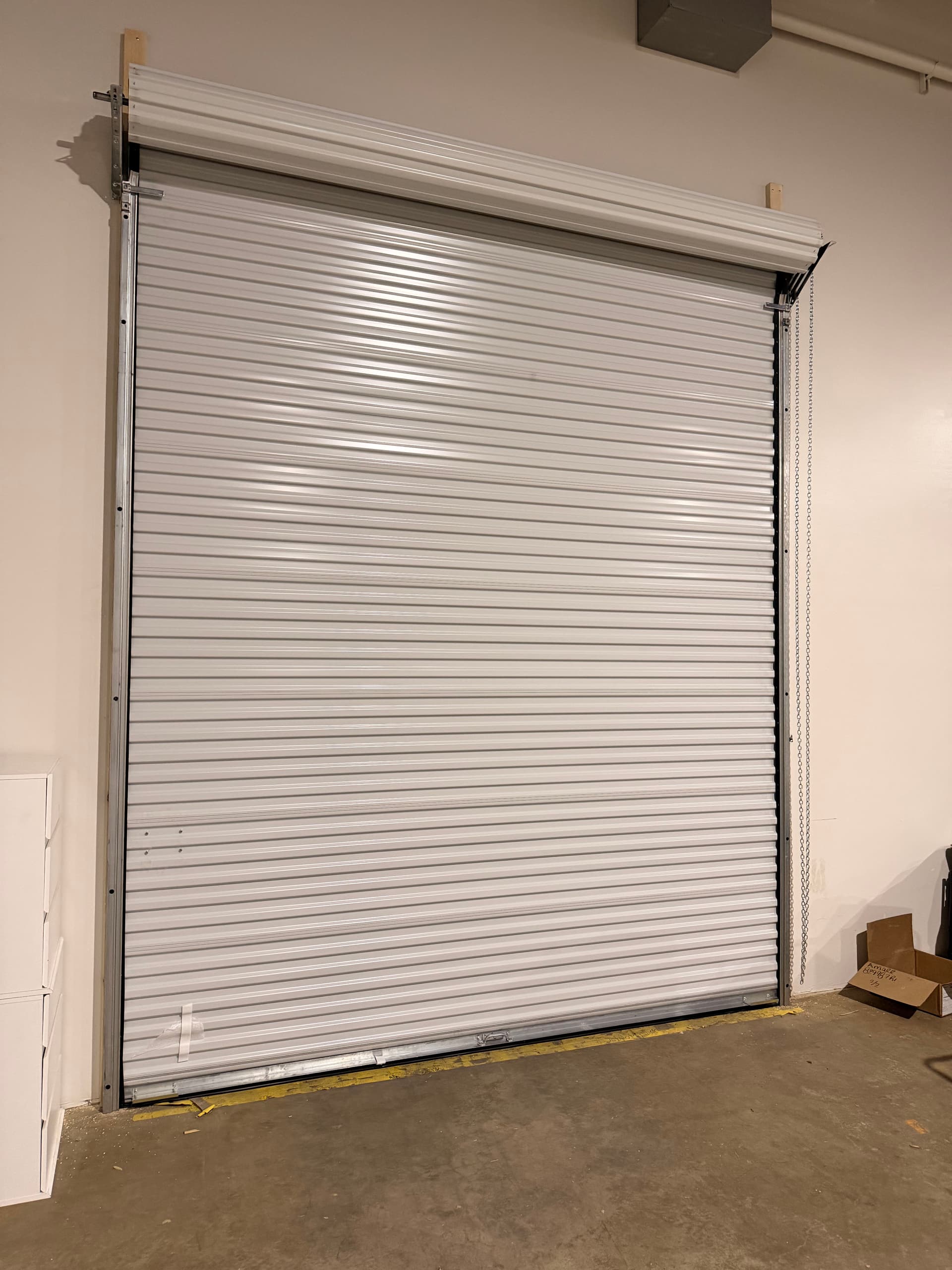 Rolling Sheet Door with Manual Chain Hoist Saves Serious Space image